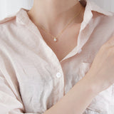 Gold pendant with cultured pearl nz