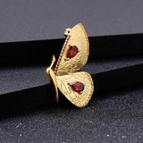 Gold butterfly necklace with garnet nz