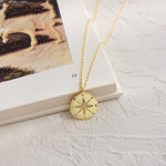 Gold compass pendant nz