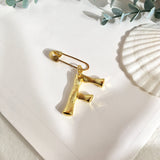 Initial brooch F nz