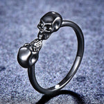 Two skulls kissing ring nz